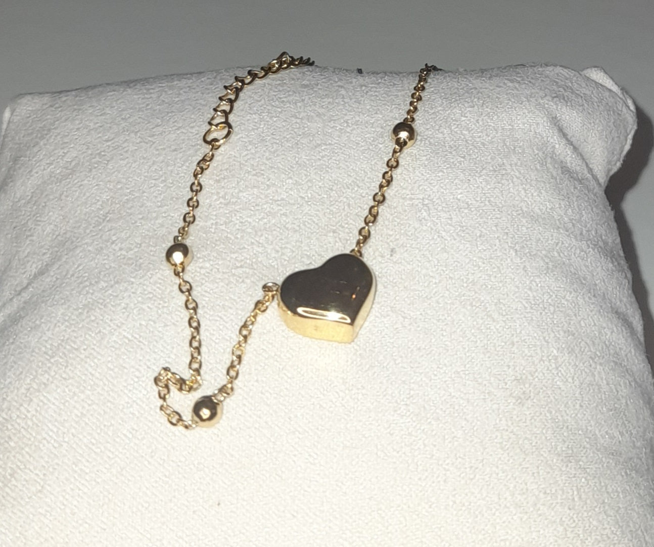 Golden titanium steel bracelet with hearth pendant