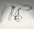 Stainless steel silver colour necklace with heart, flowers and butterfly pendant