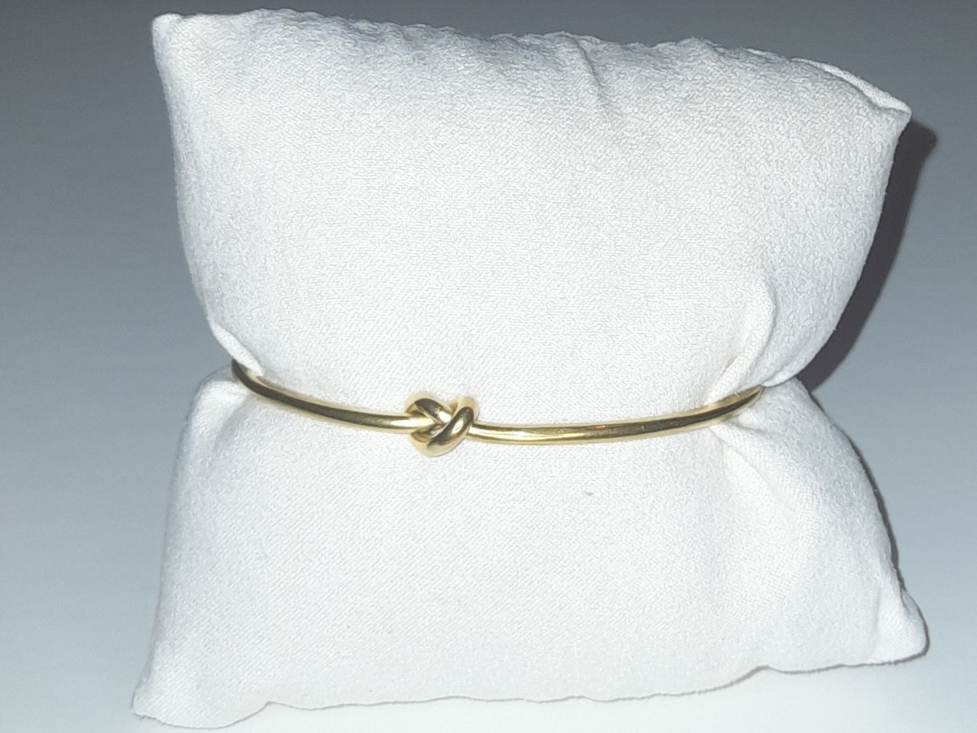 Titanium steel knotted bracelet in golden colour