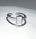Adjustable Steel Ring with a pearly rectangle and encrusted zircon