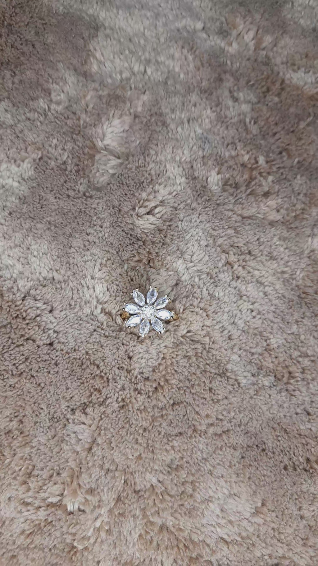 Rotating titanium steel flower ring