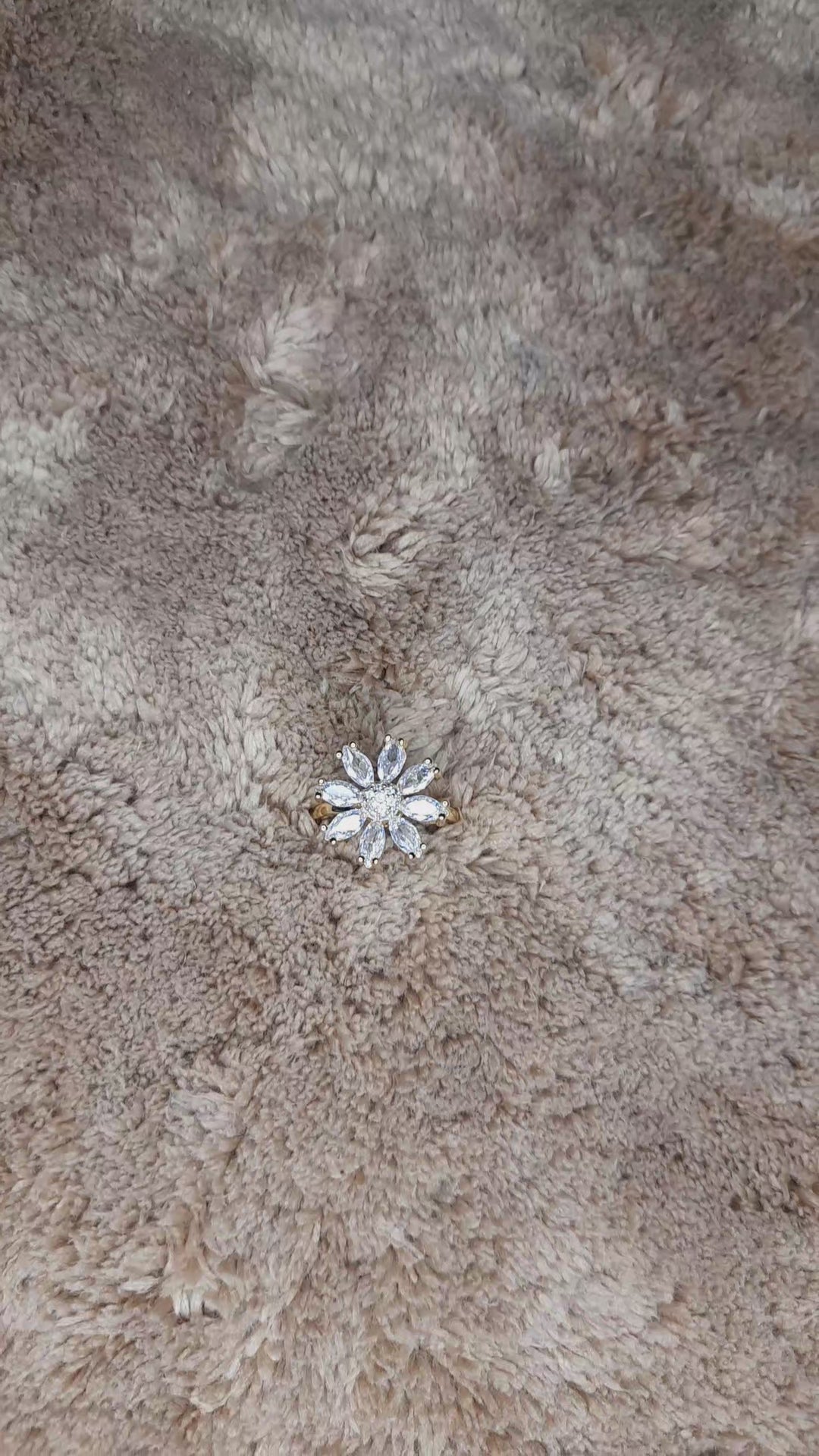 Rotating titanium steel flower ring